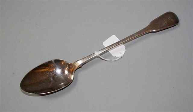 Appraisal: A GEORGE III SILVER FIDDLE PATTERN BASTING SPOON long London