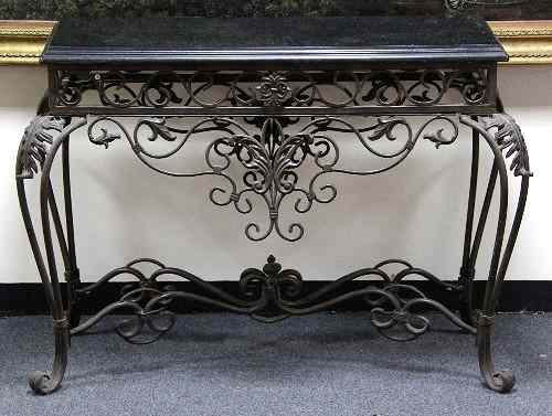 Appraisal: An iron pier table with black polished slate top and