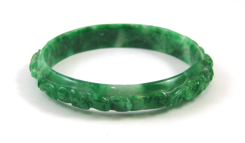 Appraisal: CARVED GREEN JADE BANGLE weighing grams and measuring - inches