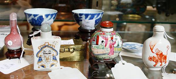 Appraisal: An assembled group of miniature Chinese objects Including four porcelain