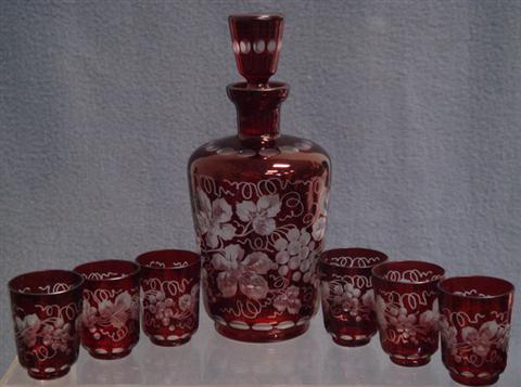 Appraisal: pc etched ruby flashed Bohemian liquer set decanter h with