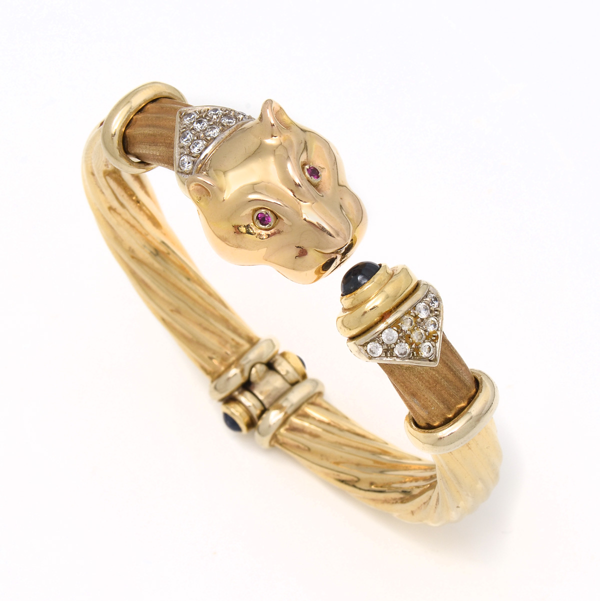 Appraisal: K ITALIAN PANTHER HEAD BANGLE WITH GEMSTONES K yellow gold