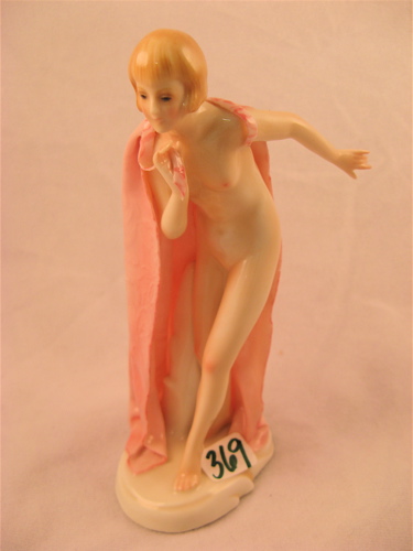 Appraisal: KARL ENS GERMAN PORCELAIN FIGURINE a nude woman holding a