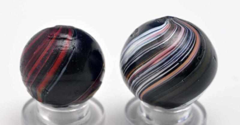 Appraisal: Lot of Indian Marbles Description Smaller marble has a black