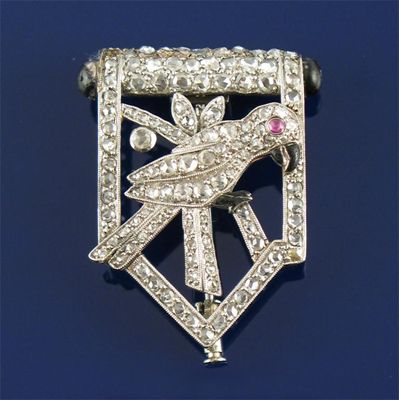 Appraisal: An art deco white gold diamond set Parrot clip Designed