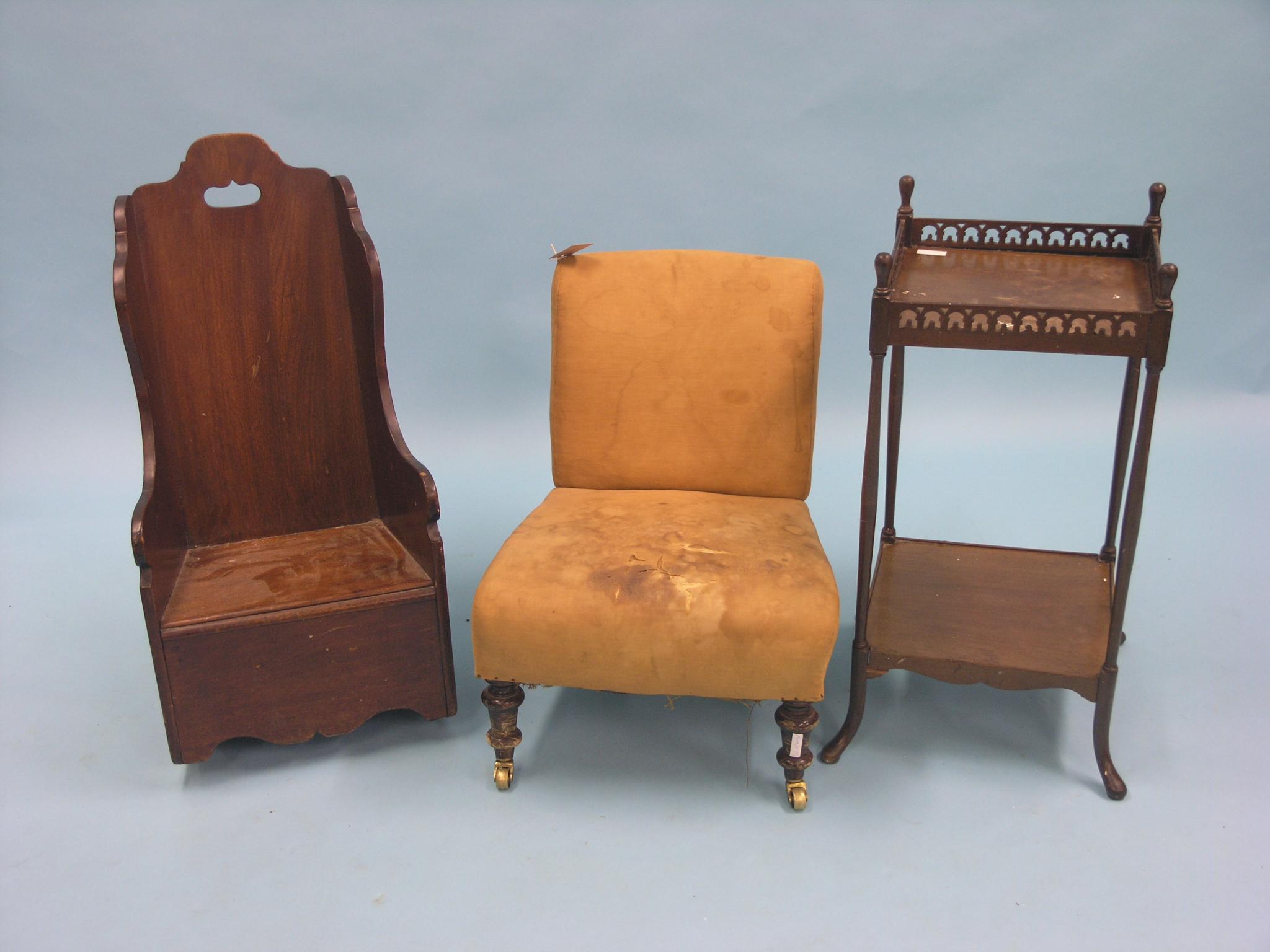 Appraisal: A th century child's mahogany rocking armchair now with solid