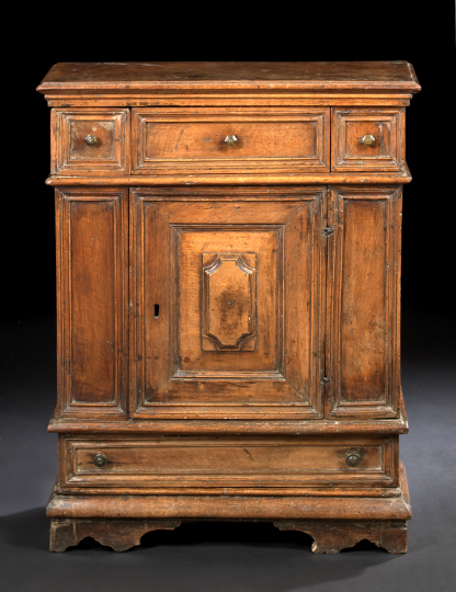 Appraisal: Italian Provincial Fruitwood Cupboard second quarter th century the rectangular