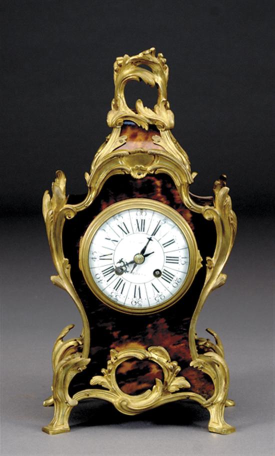 Appraisal: French Louis XVI style ormolu and shell mantel clock Passerat