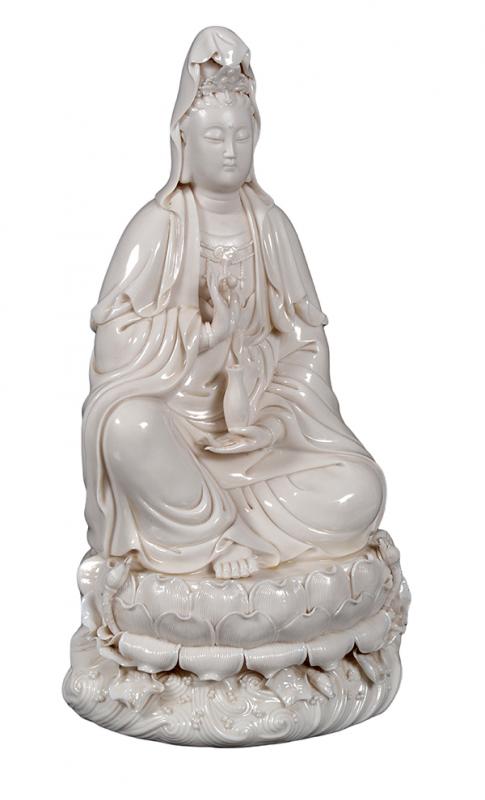 Appraisal: A CHINESE BLANC DE CHINE FIGURE OF THE WHITE-ROBED GUANYIN