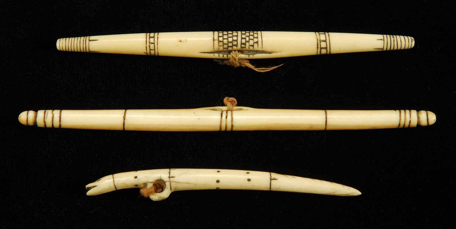 Appraisal: THREE INUIT WALRUS IVORY SYMBOLIC BAG FASTENERS th CenturyLengths ''