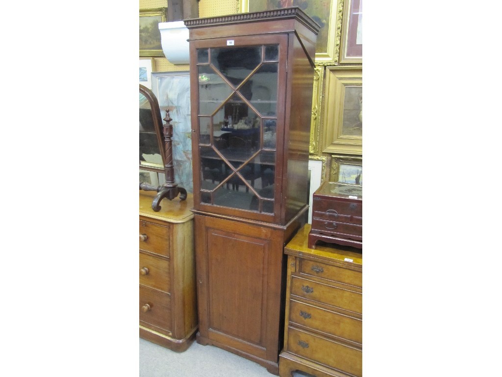 Appraisal: Victorian mahogany single door bookcase on cupboard base