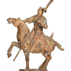 Appraisal: A Carved Chinese Warrior on Horseback th Century carved and