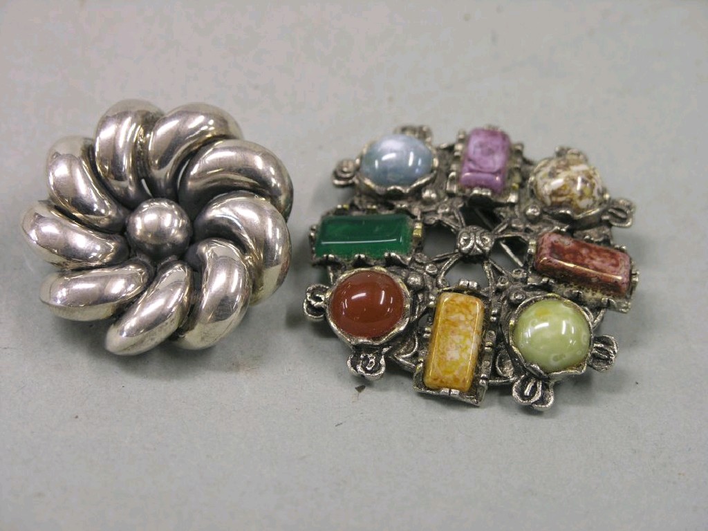 Appraisal: A Scottish hardstone brooch set eight coloured stones and a