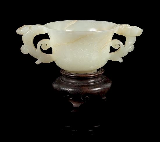 Appraisal: A White Jade Double Handled Cup Length inches A White