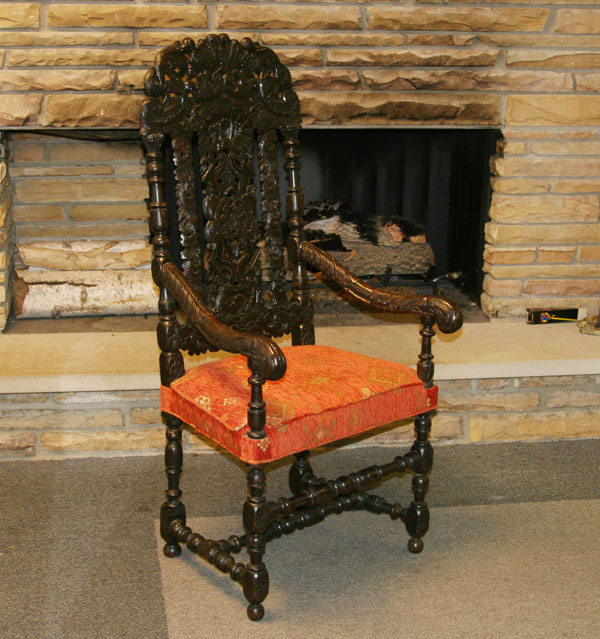 Appraisal: English Jacobean style carved oak arm chair profuse pierce carving