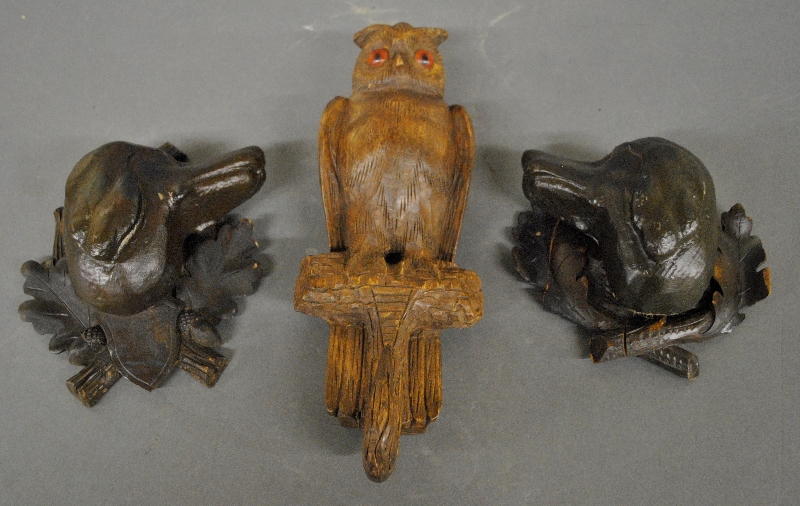 Appraisal: - Black Forest carved owl coat hook h and two