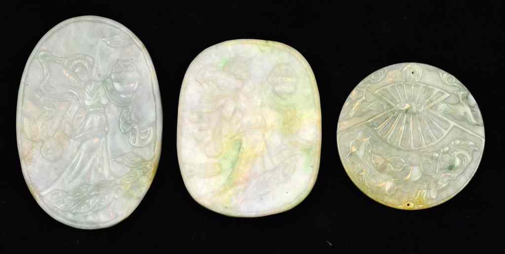 Appraisal: Chinese Qing Carved Jade PlaquesTwo finely carved to depict Guan