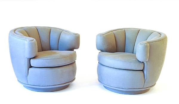 Appraisal: A pair of American swivel lounge chairsin the manner of