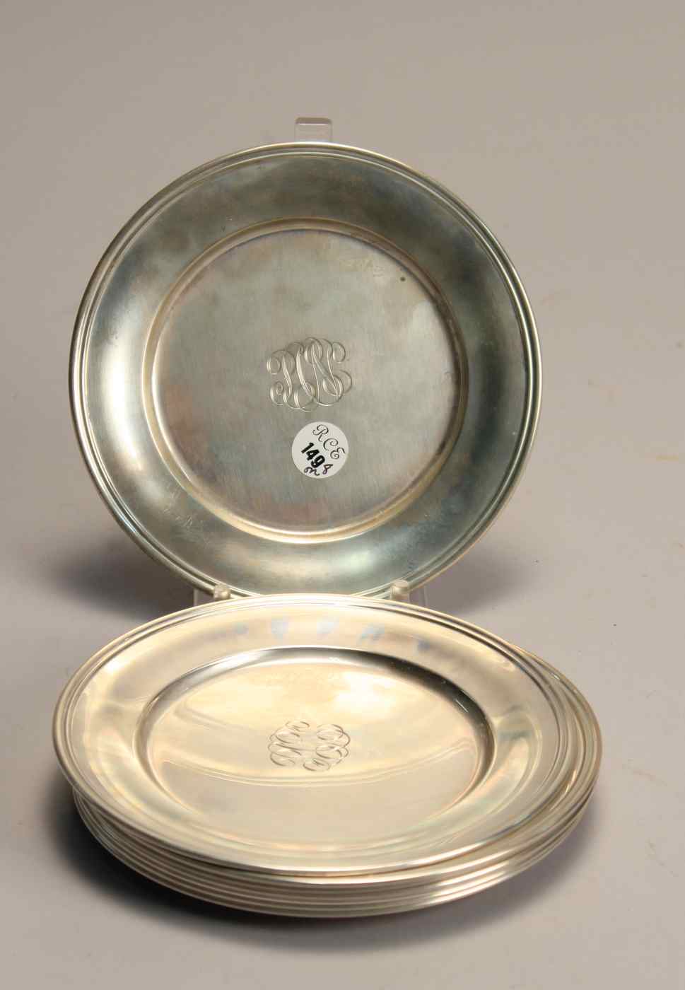 Appraisal: EIGHT STERLING SILVER BREAD PLATES BY S KIRK SONWith ribbed