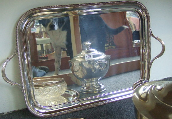 Appraisal: A plated rectangular twin handled tray decorated with a gadrooned