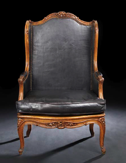 Appraisal: Provincial Louis XV-Style Fruitwood Bergere avec Orielles late th century