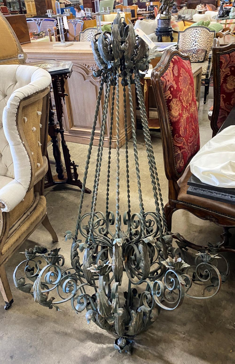 Appraisal: PAINTED WROUGHT IRON CHANDELIERwith twelve lights Condition drilled for electricity