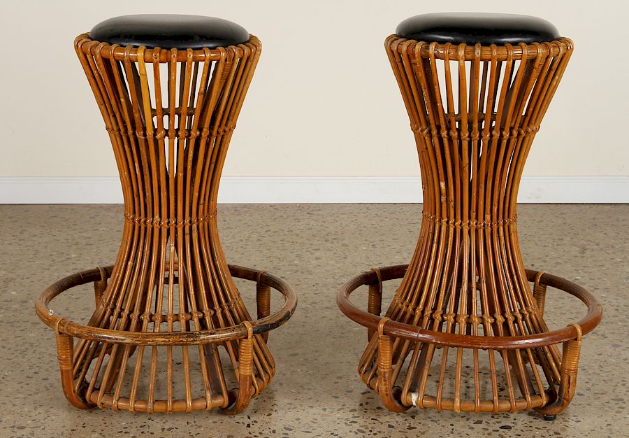 Appraisal: PAIR ITALIAN RATTAN BAR STOOLS BY TITO AGNOLI A unique