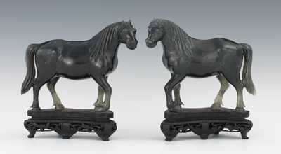 Appraisal: A Pair of Chinese Carved Black Agate Horses A handsome