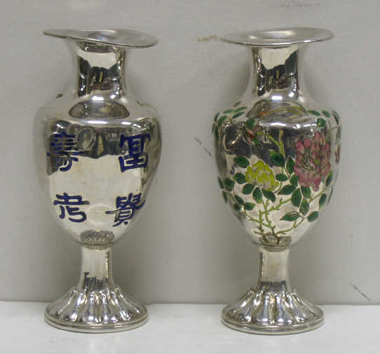 Appraisal: PAIR OF JAPANESE SILVER AND ENAMEL VASES Each baluster form