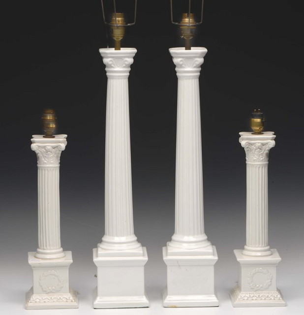 Appraisal: A PAIR OF WHITE CERAMIC TABLE LAMPS of corinthian column