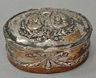 Appraisal: Continental covered silver box oval form with two embossed figures