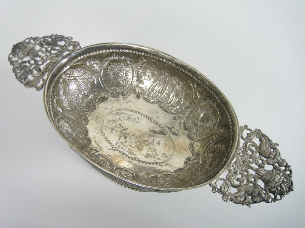 Appraisal: A Continental silver oval pedestal Bowl embossed frieze of figures