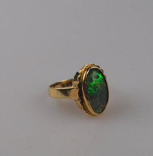 Appraisal: Opal single stone black potch opal ring stamped ct