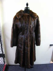 Appraisal: A long mink coat by Henry Noble of Regent Street