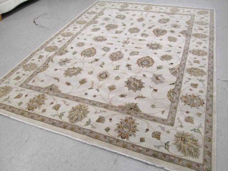 Appraisal: HAND KNOTTED ORIENTAL CARPET Indo-Persian overall scrolling floral raceme decoration