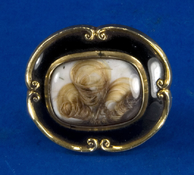 Appraisal: Nineteenth Century Gold and Enamel Mourning Brooch central hair sample