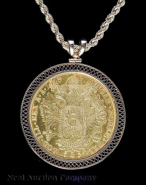 Appraisal: An Imperial Austro-Hungarian Gold Coin set in a kt yellow