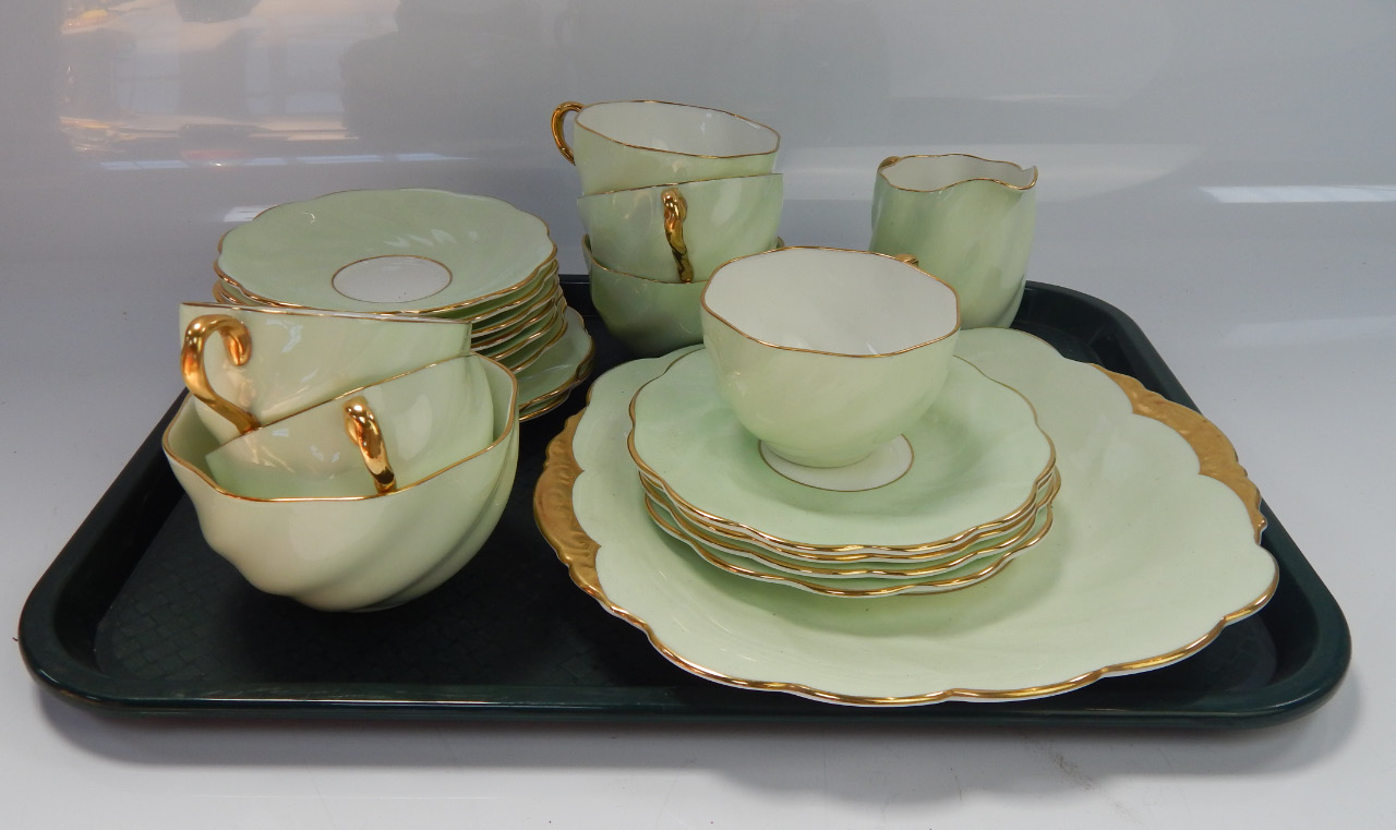 Appraisal: A Coalport part tea service comprising cups saucers side plates