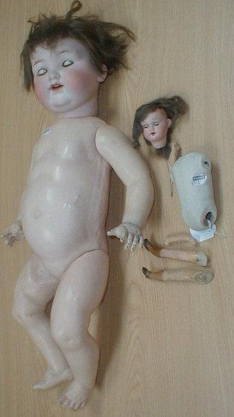 Appraisal: An Armand Marseille bisque head baby doll with a brown