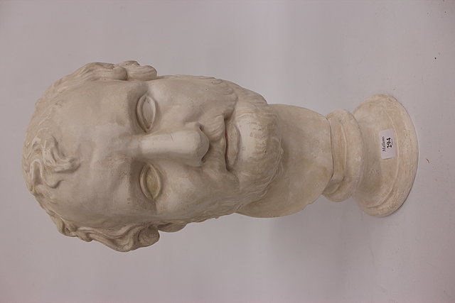 Appraisal: A PLASTER BUST after the antique standing on a circular