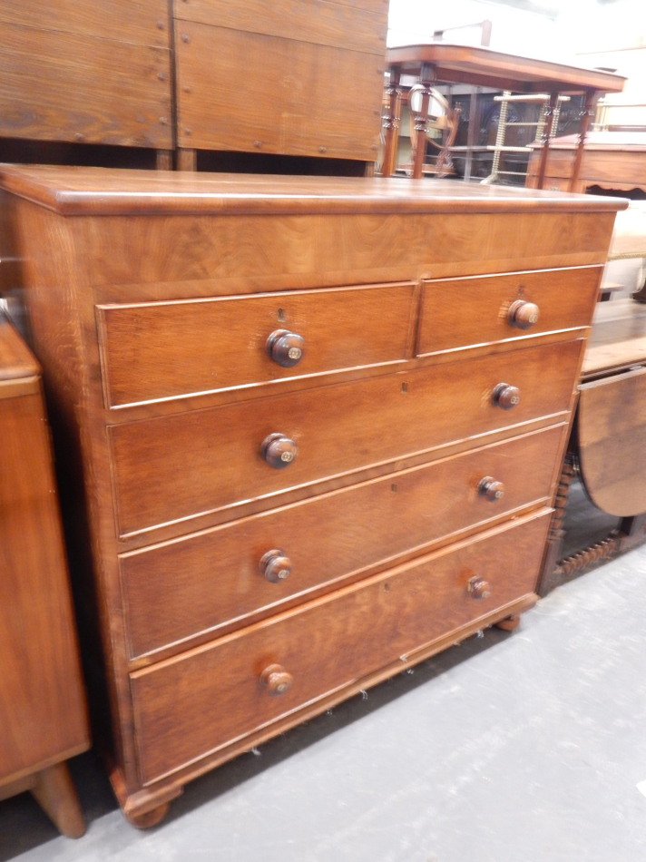 Appraisal: A Victorian oak and mahogany crossbanded chest of drawers with