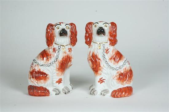 Appraisal: PAIR OF STAFFORDSHIRE DOGS Seated dogs with collar and chain