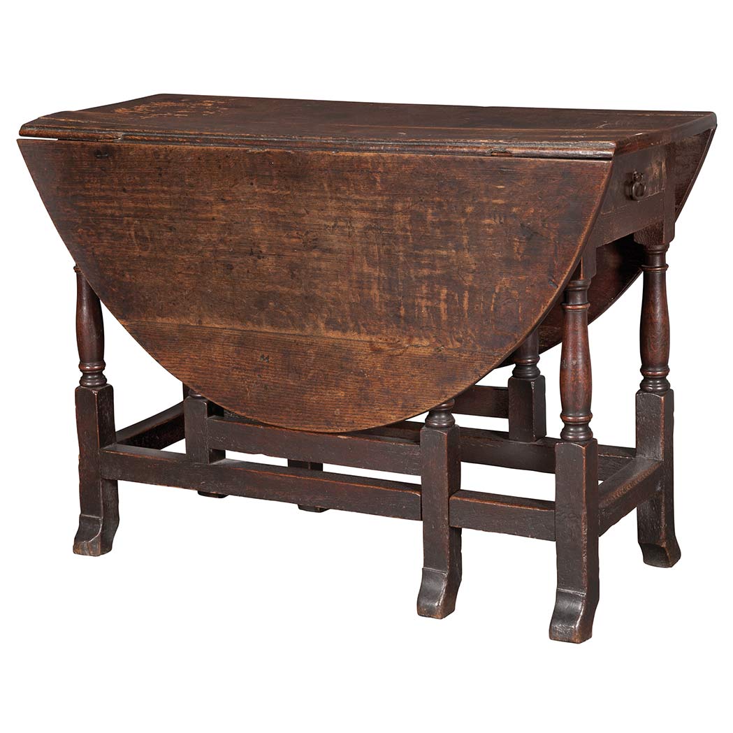 Appraisal: English Oak Drop-Leaf Table th Century The rectangular top with