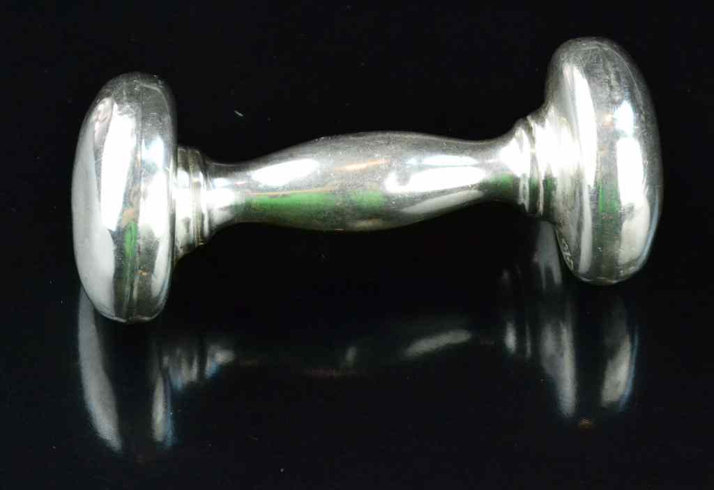 Appraisal: Webster Sterling Baby RattleOf barbell form stamped Webster Sterling total