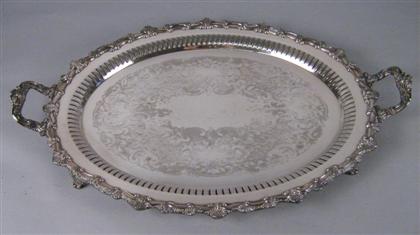 Appraisal: Sheffield silver plated two handled tray With a scrolling and