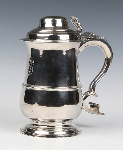 Appraisal: A GEORGE III SILVER TANKARD of baluster form with reeded