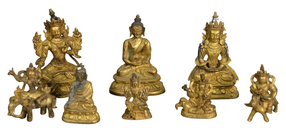 Appraisal: Eight miniature bronze gilt Buddhas heights inches to inches Eight