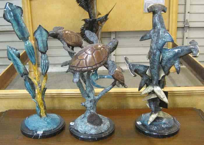 Appraisal: THREE BRONZE MARINE WILDLIFE SCULPTURES ''H hammerhead shark group ''H