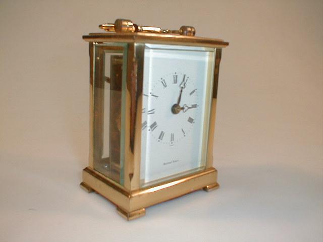 Appraisal: A gilt brass carriage timepiece high