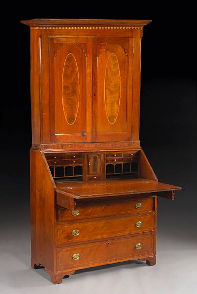 Appraisal: A Federal cherry inlaid secretary bookcase early th century The